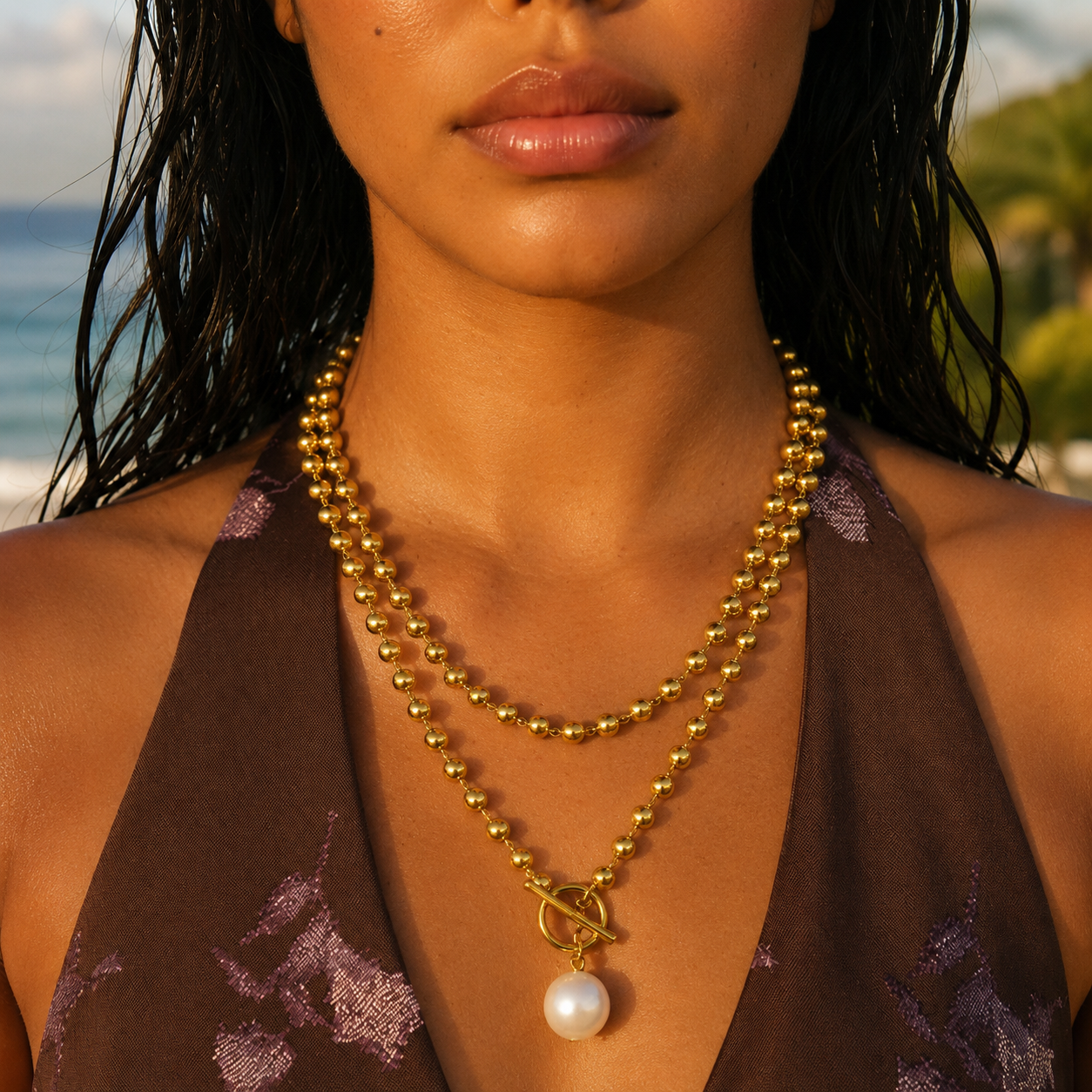 Model wearing Perly Necklace at the beach